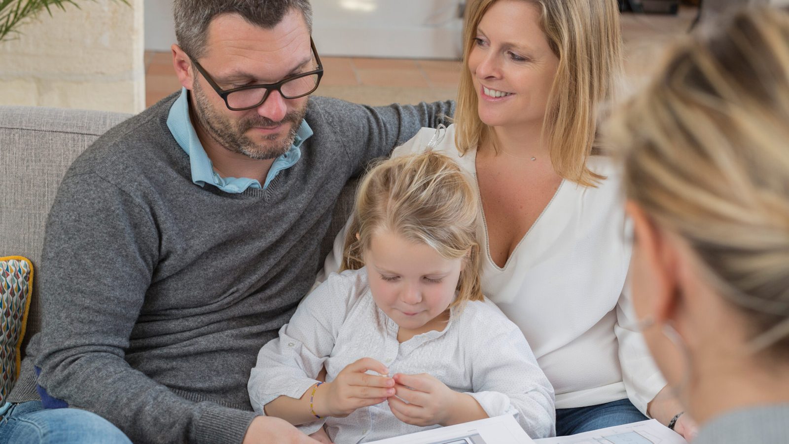 Family meeting real-estate agent for house investment