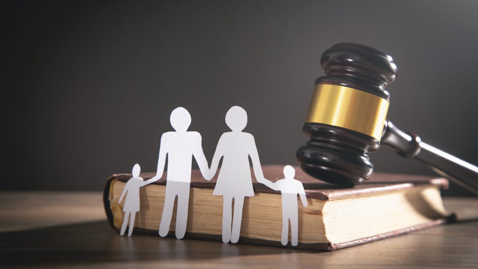 Paper cut family, judge gavel and book. Family Law