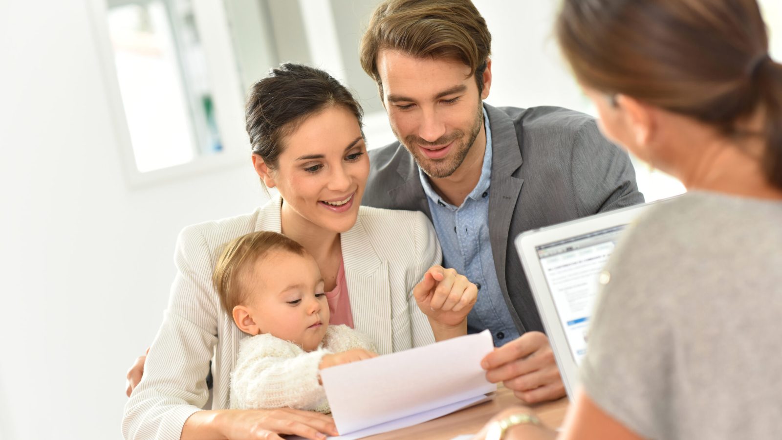 Family meeting real-estate agent for house investment